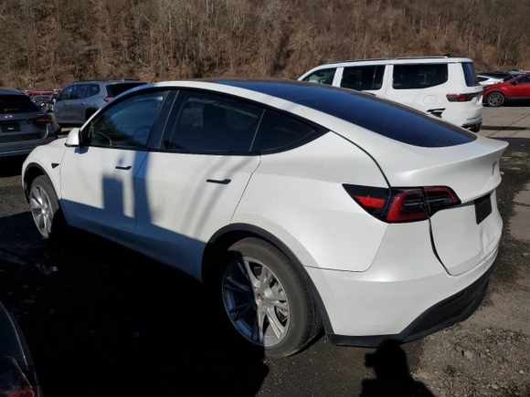 2023 Tesla Model Y Long Range z VIN 7SAYGDEE5PF785124, wystawiony jako Copart lot #56553785 z przebiegiem 31 341 mil mil oraz Szkoda całkowita • Salvage title. Historia ofert i sprzedaży dostępna na DreamBid. Obrazek 2.