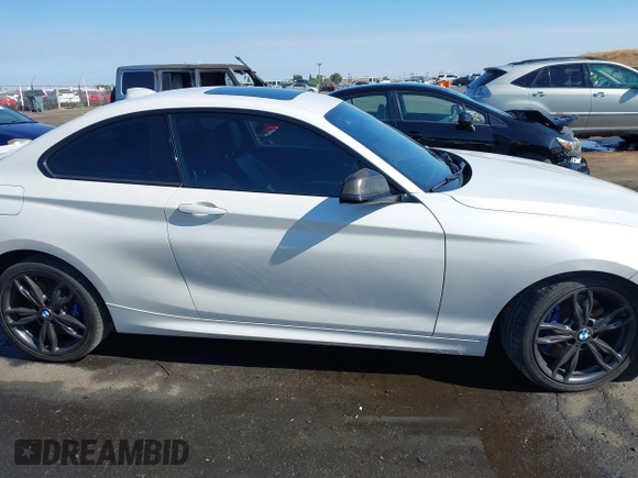 2016 BMW 2 Series M235i with VIN WBA1J7C5XGV359562, listed as a IAAI auction lot 39990299 with 54,022 mi miles. Bid and sale history available at carsss.com. Image 13.