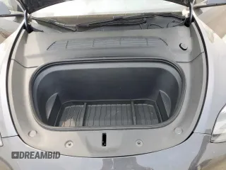 2024 Tesla Model Y Long Range with VIN 7SAYGDEE2RA287446, listed as a Copart auction lot 57640895 with 27,932 mi miles and Salvage title. Bid and sale history available at DreamBid. Image 11.
