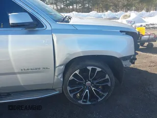 2015 GMC Yukon XL SLT with VIN 1GKS2HKC0FR287860, listed as a IAAI auction lot 41638921 with 213,214 mi miles. Bid and sale history available at carsss.com. Image 19.