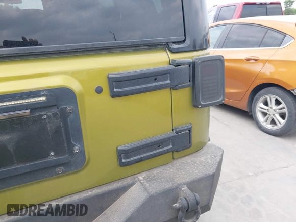 2008 Jeep Wrangler Unlimited Sahara with VIN 1J8GA59108L574959, listed as a IAAI auction lot 42171011 with Not Provided miles and . Bid and sale history available at carsss.com. Image 6.