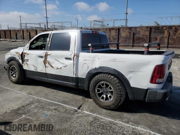 2018 Ram 1500 Rebel with VIN 1C6RR7YT7JS235965, listed as a Copart auction lot 45321275 with 61,485 mi miles and Salvage Title. Bid and sale history available at carsss.com. Image 2.
