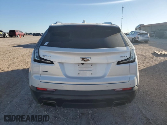 2020 Cadillac XT4 AWD Sport z VIN 1GYFZFR49LF094478, wystawiony jako Copart lot #79454264 z przebiegiem 91 405 mil mil oraz Szkoda całkowita • Salvage title. Historia ofert i sprzedaży dostępna na DreamBid. Obrazek 6.