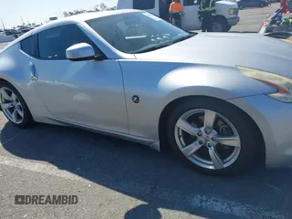 2010 Nissan 370Z Touring with VIN JN1AZ4EH6AM506591, listed as a IAAI auction lot 41838902 with 103,895 mi miles. Bid and sale history available at carsss.com. Image 13.