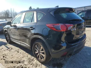 2016 Mazda CX-5 Sport with VIN JM3KE2BE1G0629430, listed as a Copart auction lot 82442654 with 130,289 mi miles and Salvage Title. Bid and sale history available at DreamBid. Image 2.