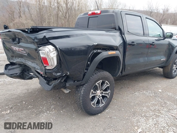 2023 GMC Canyon 4WD AT4 with VIN 1GTP6DEK9P1151776, listed as a IAAI auction lot 41655533 with 11,750 mi miles. Bid and sale history available at carsss.com. Image 4.