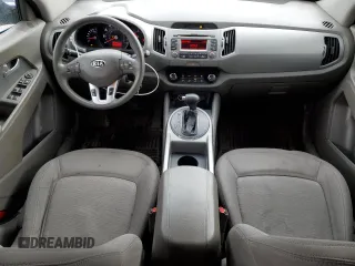 2012 Kia Sportage LX with VIN KNDPBCA25C7285039, listed as a Copart auction lot 52620735 with 197,305 mi miles and Salvage title. Bid and sale history available at DreamBid. Image 8.