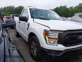 2021 Ford F-150 XL with VIN 1FTMF1CB5MKE25341, listed as a IAAI auction lot 42103478 with 125,369 mi miles and . Bid and sale history available at DreamBid. Image 1.