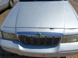 1998 Mercury Grand Marquis LS with VIN 2MEFM75W6WX669533, listed as a IAAI auction lot 41896982 with 153,155 mi miles. Bid and sale history available at carsss.com. Image 6.