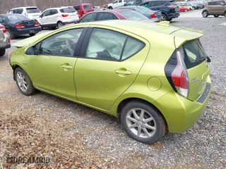2015 Toyota Prius c One with VIN JTDKDTB38F1114272, listed as a IAAI auction lot 41224252 with 59,717 mi miles. Bid and sale history available at carsss.com. Image 3.