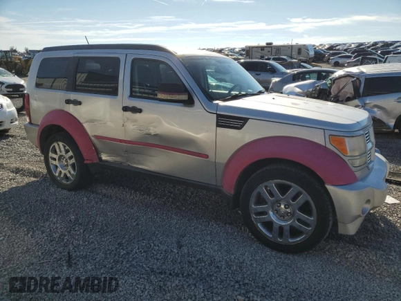 2010 Dodge Nitro SXT z VIN 1D4PT5GKXAW108802, wystawiony jako Copart lot #80215434 z przebiegiem 225 908 mil mil oraz Szkody całkowita. Historia ofert i sprzedaży dostępna na DreamBid. Obrazek 4.