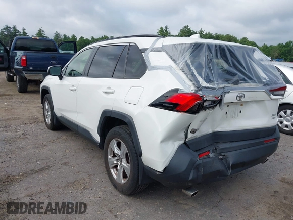 2019 Toyota RAV4 XLE with VIN JTMP1RFV6KD515454, listed as a IAAI auction lot 42618019 with 85,868 mi miles and . Bid and sale history available at DreamBid. Image 3.