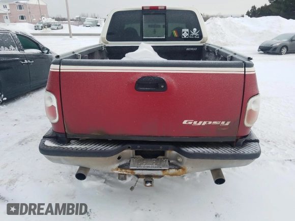1998 Ford F-150 XL with VIN 2FTRX08L2WCA75995, listed as a Copart auction lot 43717305 with 301,987 mi miles and Salvage title. Bid and sale history available at DreamBid. Image 6.