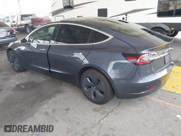 2020 Tesla Model 3 Standard Range Plus with VIN 5YJ3E1EA8LF743405, listed as a IAAI auction lot 41923592 with 81,901 mi miles. Bid and sale history available at carsss.com. Image 3.