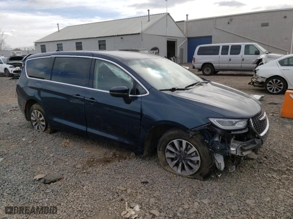 2023 Chrysler Pacifica Hybrid Touring L with VIN 2C4RC1L70PR614642, listed as a Copart auction lot 45933065 with 94,992 mi miles and Salvage Title. Bid and sale history available at carsss.com. Image 4.