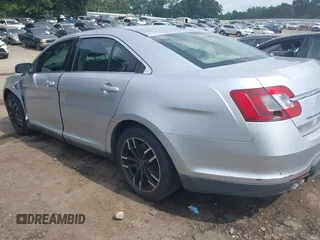 2011 Ford Taurus SE with VIN 1FAHP2DW9BG179423, listed as a IAAI auction lot 39683731 with 297,445 mi miles. Bid and sale history available at carsss.com. Image 14.