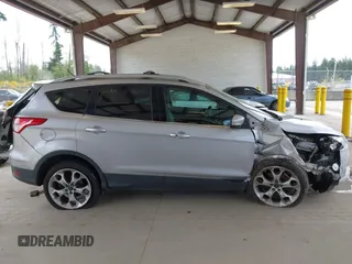 2013 Ford Escape Titanium с VIN 1FMCU9J98DUB24112, выставлен на аукционе IAAI как лот 42338121 с пробегом 162 786 миль миль и . История ставок и продаж доступна на DreamBid. Изображение 14.