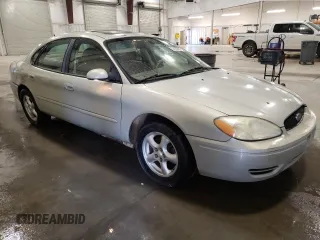 2007 Ford Taurus SEL with VIN 1FAFP56UX7A162399, listed as a Copart auction lot 52720425 with 148,240 mi miles and Salvage Title. Bid and sale history available at DreamBid. Image 4.