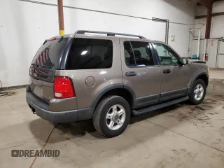 2003 Ford Explorer XLT with VIN 1FMZU73W03UA58560, listed as a Copart auction lot 87354824 with 157,052 mi miles and Salvage title. Bid and sale history available at DreamBid. Image 3.