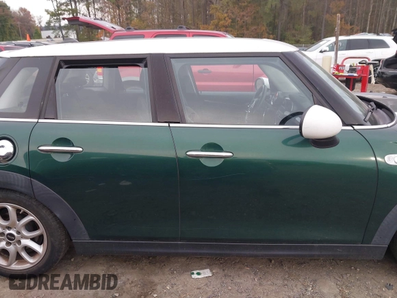 2015 MINI Hardtop 4 Door S with VIN WMWXU3C5XF2B59066, listed as a IAAI auction lot 40900773 with 14,618 mi miles and . Bid and sale history available at DreamBid. Image 13.