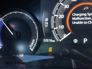 2022 Mazda MX-30 Premium Plus z VIN JM1DRADB6N0100295, wystawiony jako IAAI lot #41885035 z przebiegiem 32 616 mil mil oraz . Historia ofert i sprzedaży dostępna na DreamBid. Obrazek 7.