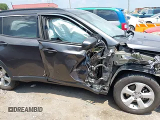 2019 Jeep Compass Latitude with VIN 3C4NJCBB1KT833007, listed as a IAAI auction lot 42401265 with 106,973 mi miles and . Bid and sale history available at DreamBid. Image 13.