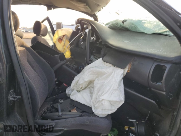 2000 Saturn SL with VIN 1G8ZK527XYZ259766, listed as a Copart auction lot 48911825 with Not provided miles and Salvage title. Bid and sale history available at DreamBid. Image 7.