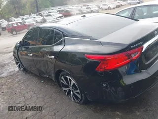 2018 Nissan Maxima SV z VIN 1N4AA6AP9JC369624, wystawiony jako IAAI lot #41902943 z przebiegiem 121 615 mil mil oraz . Historia ofert i sprzedaży dostępna na DreamBid. Obrazek 14.