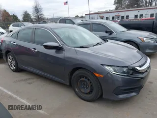2017 Honda Civic LX with VIN 19XFC2F52HE233607, listed as a IAAI auction lot 41758632 with 159,290 mi miles and . Bid and sale history available at DreamBid. Image 13.