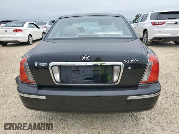 2005 Hyundai XG z VIN KMHFU45E65A379433, wystawiony jako Copart lot #73921434 z przebiegiem Nie podano mil oraz Szkoda całkowita • Salvage title. Historia ofert i sprzedaży dostępna na DreamBid. Obrazek 6.