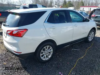 2021 Chevrolet Equinox LT with VIN 3GNAXUEV1MS163922, listed as a IAAI auction lot 41673516 with 61,408 mi miles and . Bid and sale history available at carsss.com. Image 4.