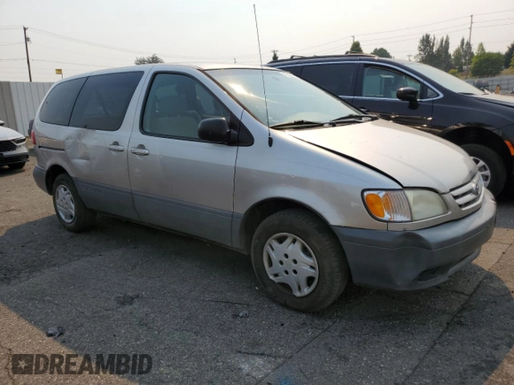 2001 Toyota Sienna CE with VIN 4T3ZF19C11U412899, listed as a Copart auction lot 70303244 with 190,025 mi miles and Salvage Title. Bid and sale history available at DreamBid. Image 4.