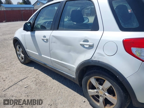 2012 Suzuki SX4 Crossover with VIN JS2YB5A35C6308615, listed as a IAAI auction lot 42090449 with 173,000 mi miles. Bid and sale history available at carsss.com. Image 6.