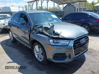 2017 Audi Q3 Premium Plus z VIN WA1JCCFS5HR003127, wystawiony jako IAAI lot #42060877 z przebiegiem 78 881 mil mil oraz . Historia ofert i sprzedaży dostępna na DreamBid. Obrazek 1.