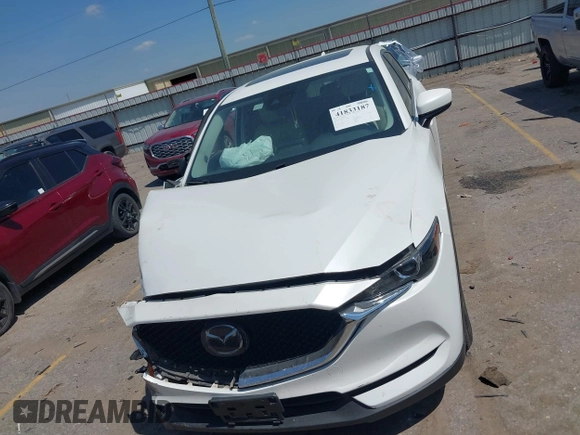 2019 Mazda CX-5 Touring with VIN JM3KFACM7K1656311, listed as a IAAI auction lot 41833187 with 83,888 mi miles. Bid and sale history available at carsss.com. Image 12.