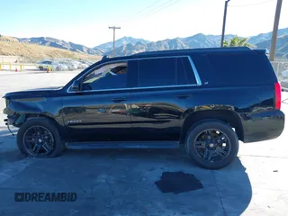 2017 Chevrolet Tahoe LT with VIN 1GNSCBKC4HR187227, listed as a IAAI auction lot 37971302 with 95,009 mi miles and . Bid and sale history available at DreamBid. Image 13.