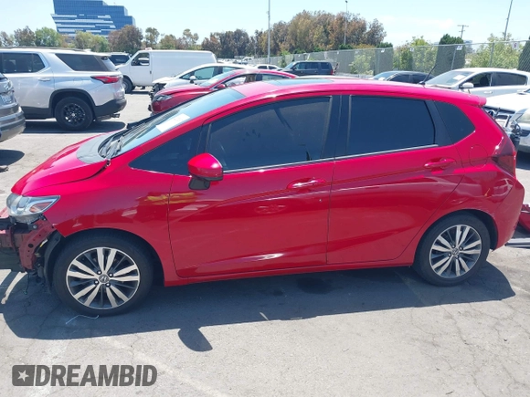 2015 Honda Fit EX-L z VIN 3HGGK5H84FM742893, wystawiony jako IAAI lot #42272487 z przebiegiem 84 942 mil mil oraz . Historia ofert i sprzedaży dostępna na DreamBid. Obrazek 15.