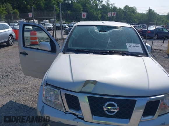 2018 Nissan Frontier SV with VIN 1N6AD0EVXJN743148, listed as a IAAI auction lot 42398810 with 82,286 mi miles and . Bid and sale history available at DreamBid. Image 6.