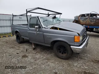 1987 Ford F-150 with VIN 1FTDF15Y6HPA66012, listed as a Copart auction lot 85805244 with 32,344 mi miles and Salvage Title. Bid and sale history available at carsss.com. Image 4.