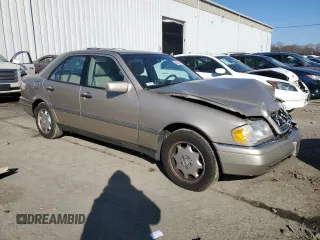1996 Mercedes-Benz C with VIN WDBHA28E7TF319617, listed as a Copart auction lot 80874744 with 92,068 mi miles and Salvage Title. Bid and sale history available at carsss.com. Image 4.