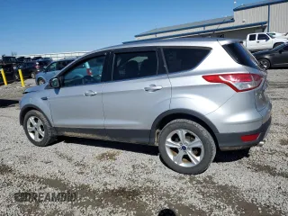 2015 Ford Escape SE with VIN 1FMCU0GX1FUA50830, listed as a Copart auction lot 47735295 with 188,248 mi miles and Salvage Title. Bid and sale history available at DreamBid. Image 2.