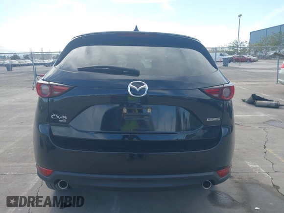 2021 Mazda CX-5 Grand Touring with VIN JM3KFBDM4M1426197, listed as a IAAI auction lot 42004644 with 43,814 mi miles. Bid and sale history available at carsss.com. Image 17.