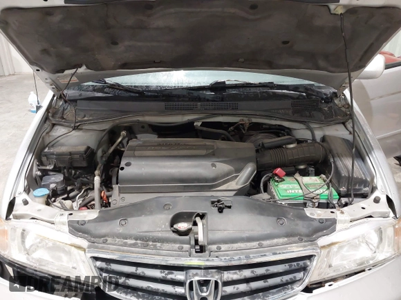 2003 Honda Odyssey EX with VIN 5FNRL18673B009670, listed as a IAAI auction lot 42130172 with 218,391 mi miles and . Bid and sale history available at DreamBid. Image 10.