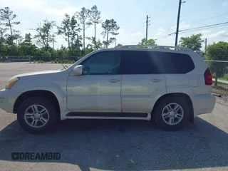 2003 Lexus GX 470 with VIN JTJBT20X630019033, listed as a IAAI auction lot 42128698 with 286,811 mi miles and . Bid and sale history available at DreamBid. Image 14.
