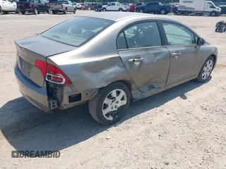 2006 Honda Civic LX with VIN 1HGFA165X6L151906, listed as a IAAI auction lot 42581843 with 97,675 mi miles and . Bid and sale history available at DreamBid. Image 4.