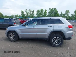 2014 Jeep Grand Cherokee Limited with VIN 1C4RJFBGXEC517832, listed as a IAAI auction lot 42583697 with 107,719 mi miles and . Bid and sale history available at DreamBid. Image 15.