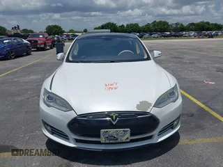 2013 Tesla Model S with VIN 5YJSA1CG4DFP21658, listed as a IAAI auction lot 42398609 with 116,068 mi miles and . Bid and sale history available at DreamBid. Image 12.