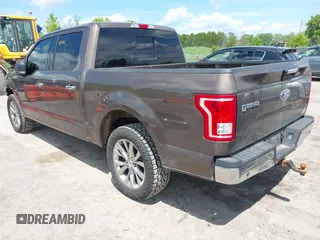 2015 Ford F-150 XL with VIN 1FTEW1CGXFKD07711, listed as a IAAI auction lot 42371362 with 128,186 mi miles and . Bid and sale history available at DreamBid. Image 3.