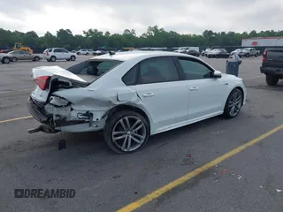 2018 Volkswagen Passat S z VIN 1VWAA7A39JC016259, wystawiony jako IAAI lot #42382550 z przebiegiem 89 143 mil mil oraz . Historia ofert i sprzedaży dostępna na DreamBid. Obrazek 4.