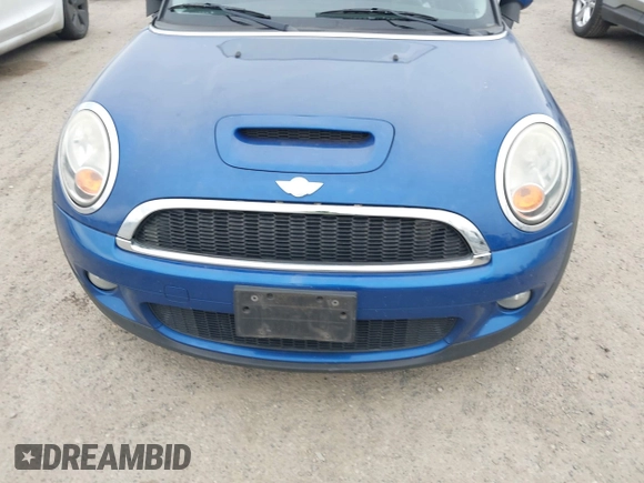 2007 MINI Hardtop S with VIN WMWMF73527TL91061, listed as a IAAI auction lot 41842104 with 65,259 mi miles and . Bid and sale history available at DreamBid. Image 6.